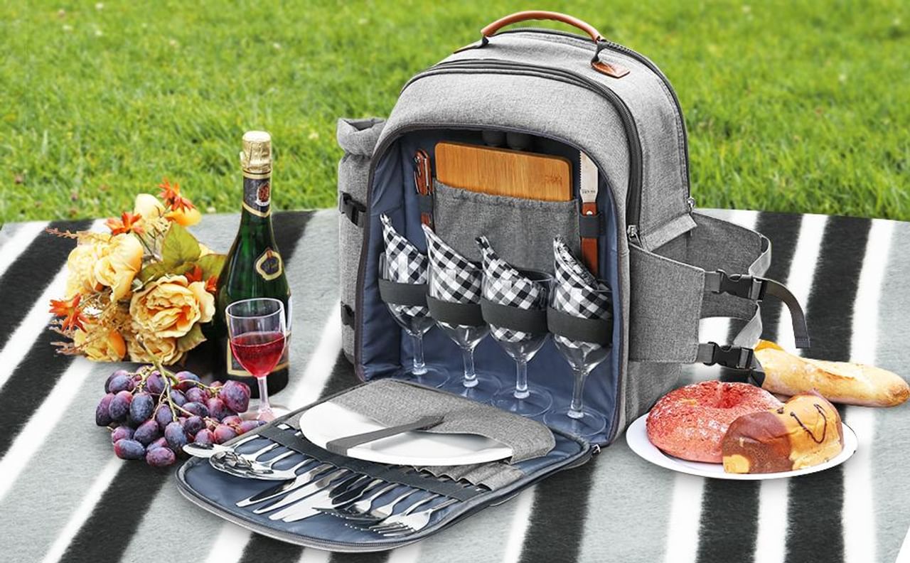 Sunflora Picnic Backpack for 4 Person Set: This bag pack includes plates, glasses, cutlery, a cutting board, and a picnic blanket along with pouches, a knife and space for your salt and pepper shakers! All of these items that too in a bagpack like design so you can have your perfect picnic without the fear of losing things. 
Pic Credit: Google