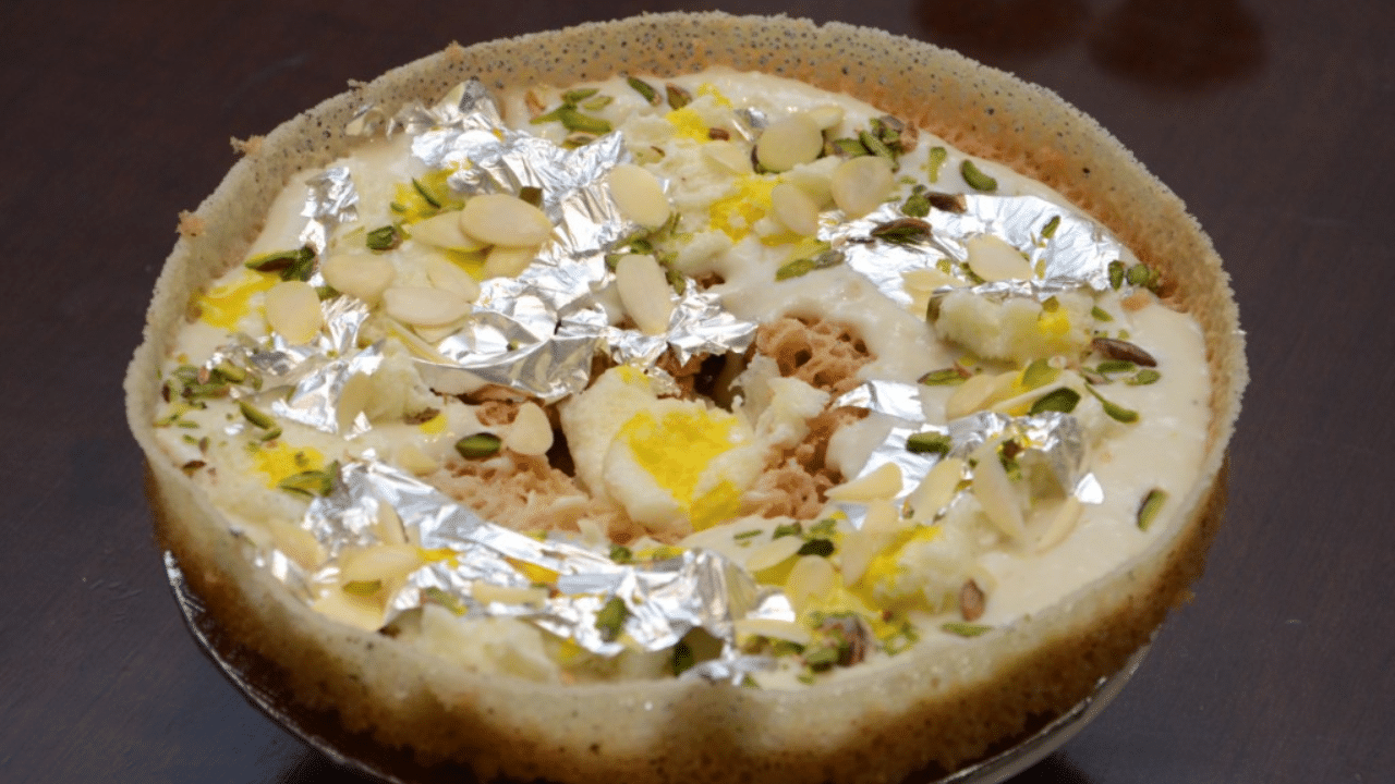Malai Ghewar: The traditional Rajasthani sweet, Ghevar, has a delectable and well-known variety called Malai Ghewar. In this variation, a thick layer of malai, a sort of sweetened cream, is placed on top of the ghevar. The malai normally has a rich, creamy, and sweet (picture credit: Sag mart)