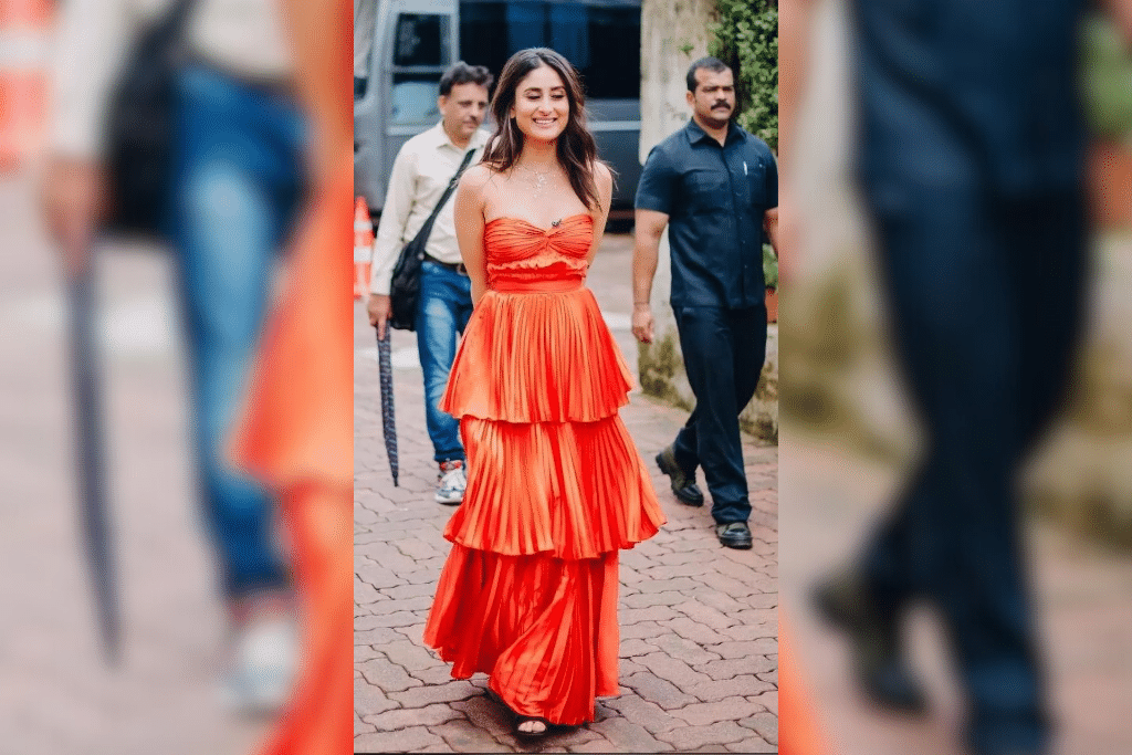 Ethereal Queen: Kareena looked charming in a strapless corset styled dress adorned with ruffles and tiered pleats. The star completed her billowy ensemble with beach waves , necklace and dewy makeup. (Photo Courtesy: Pinterest)