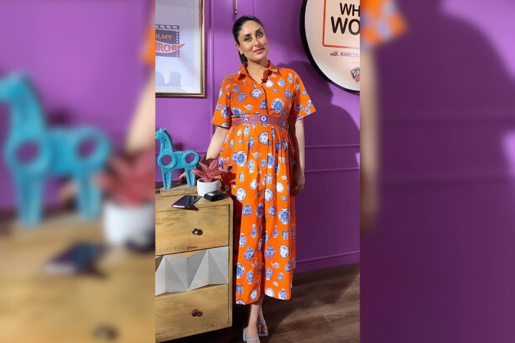 Breezy and Chic: Kareena looked super chic in a bright orange printed shirt dress. The star rounded off her breezy ensemble with pastel blue block heels and a matching printed fabric belt that cinched her waist. (Photo Courtesy: Pinterest)