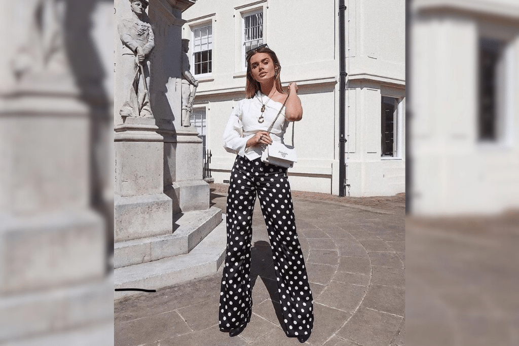 white top and polka dot trousers